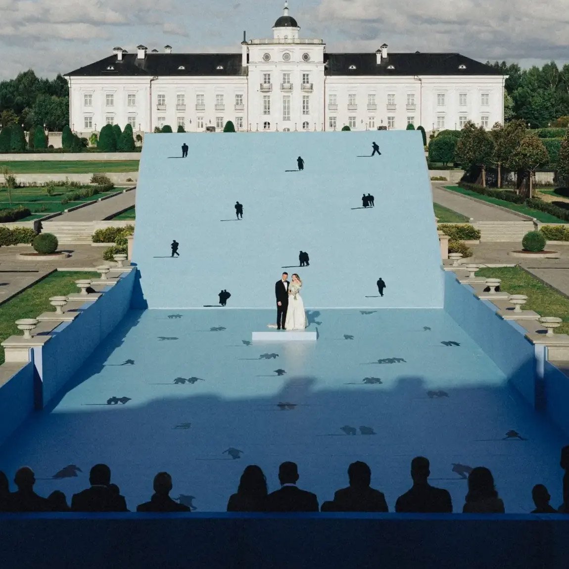 With a powder blue wedding art installation ceremony